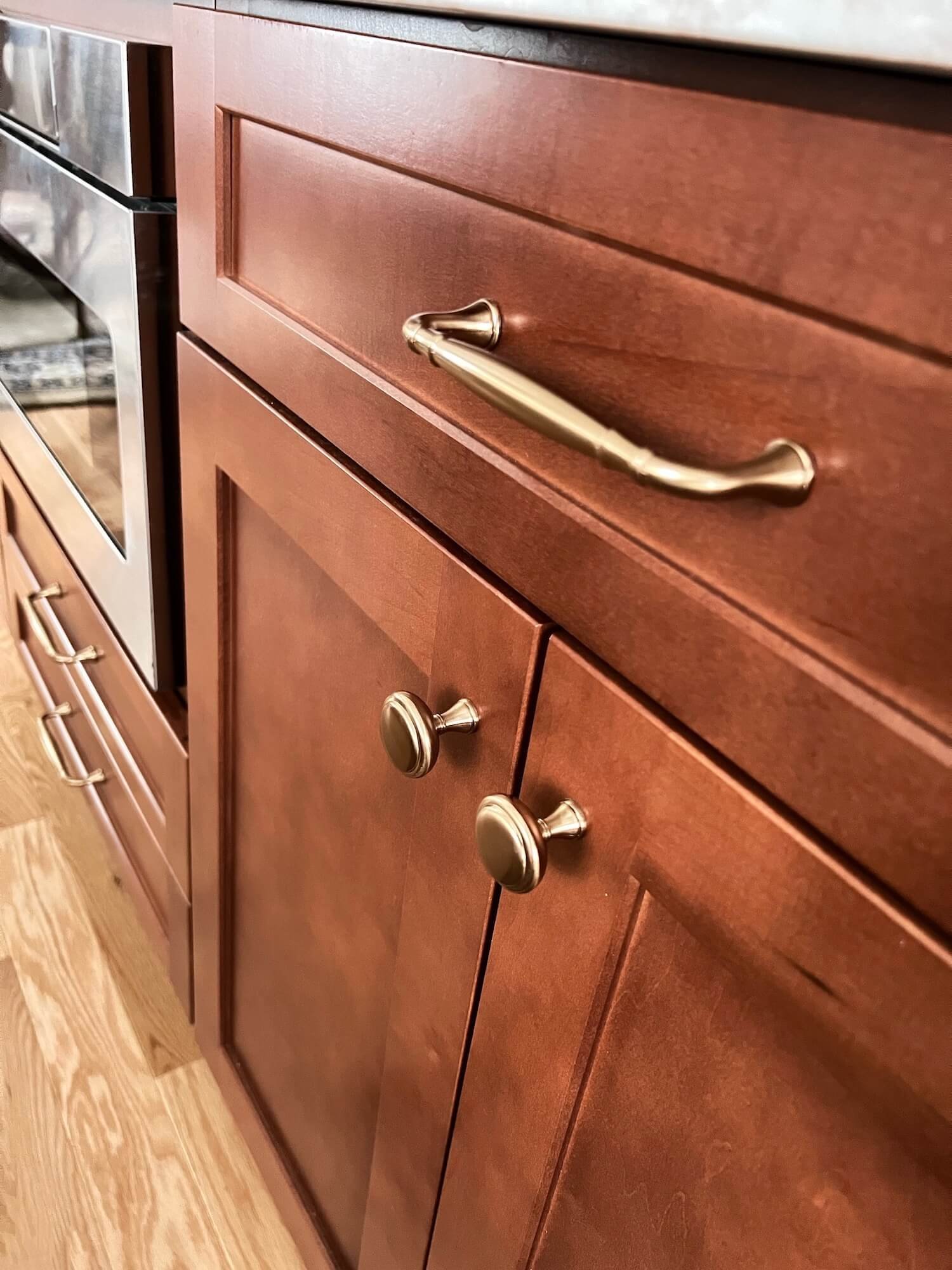 Honey bronze cabinet hardware finish detail